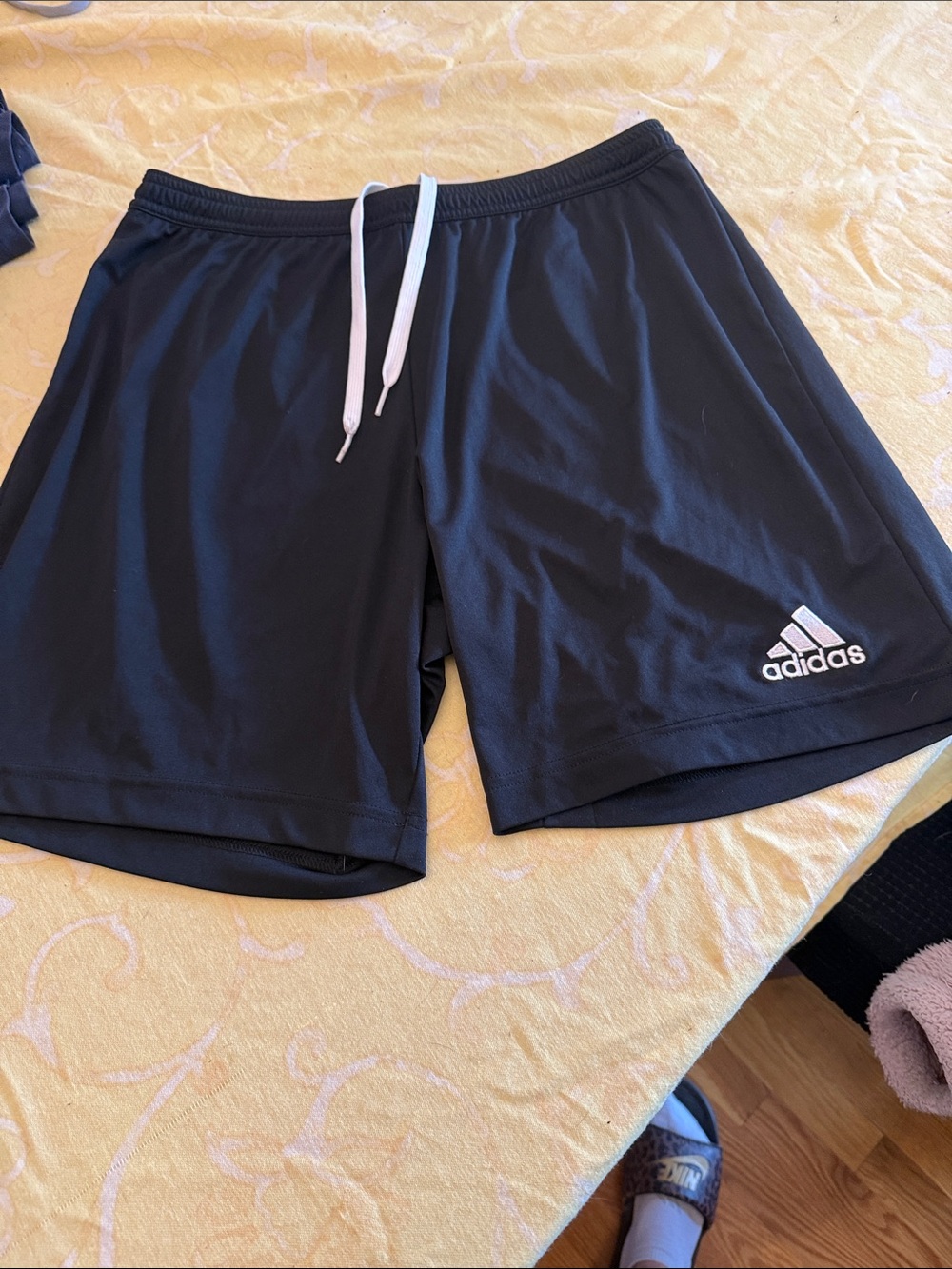 adidas Men’s Black Athletic Shorts with White Drawstring
Size large